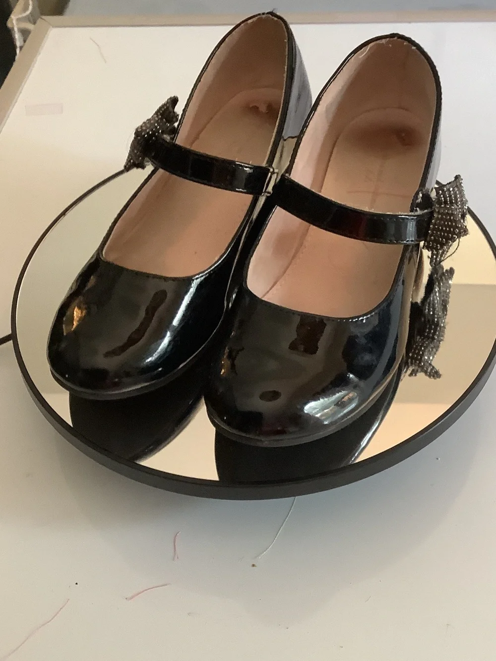 cupcakes & cashmere Black Patent Mary Jane Wedges with Embellished Bow